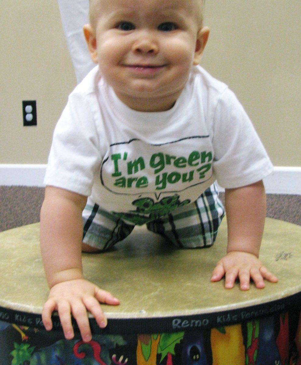baby playing drum