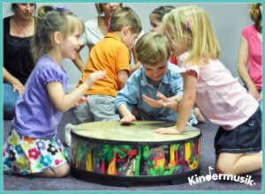 synchrony on the drums in Kindermusik class