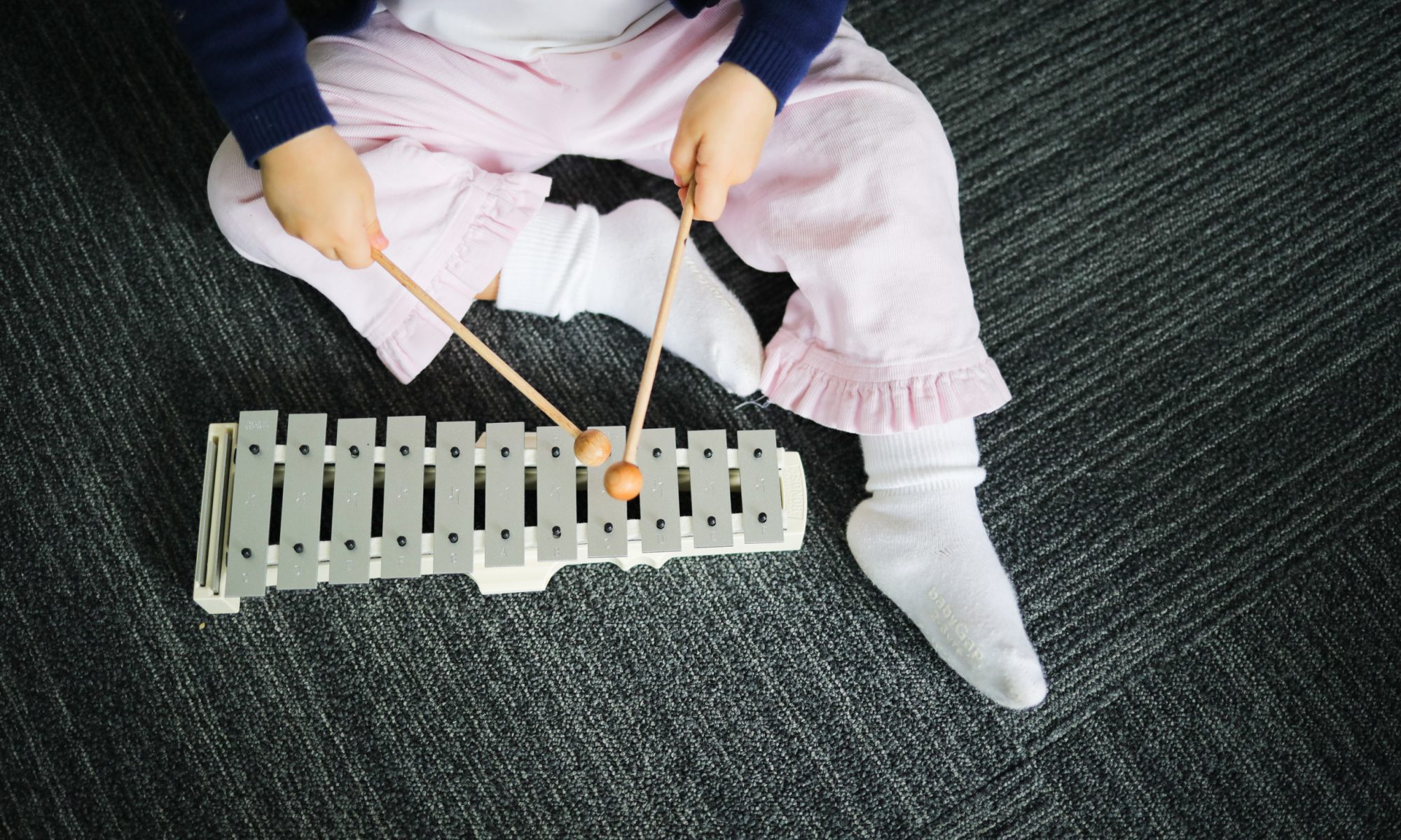 Kindermusik Class - Child with Glockenspiel