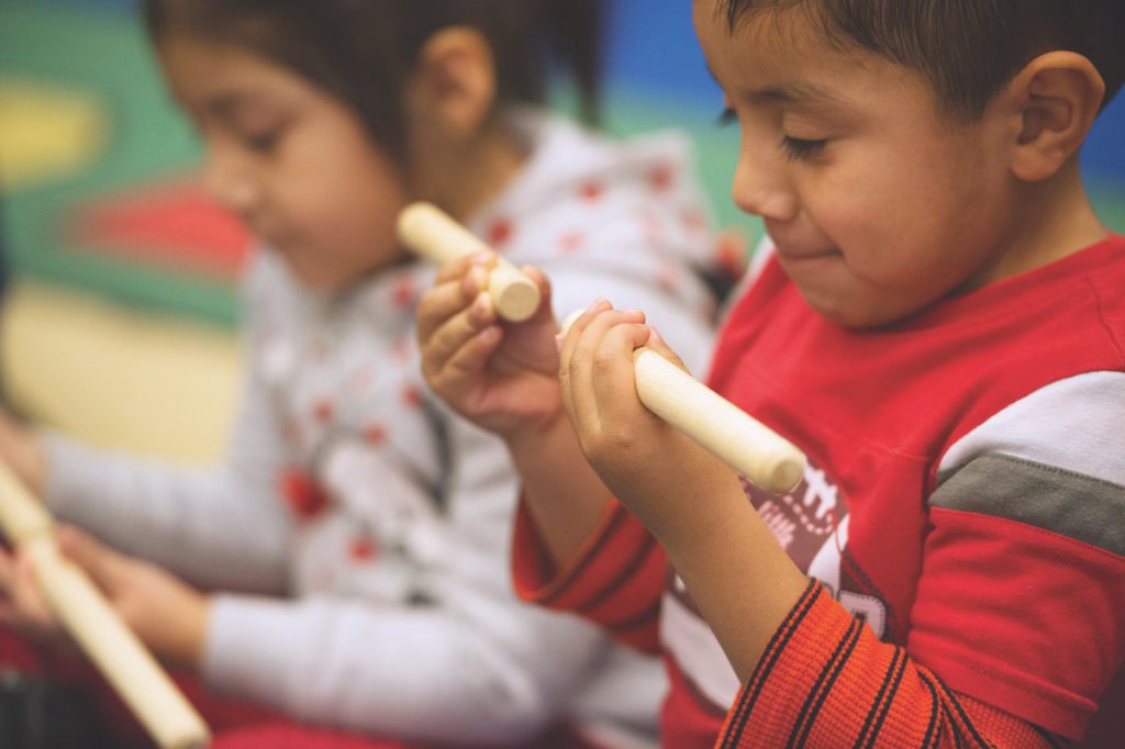 Music classes help parents and caregivers look for signs of early hearing loss and volume sensitivity. 